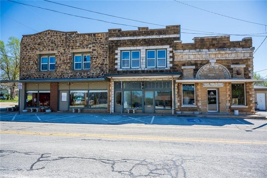 There is nothing like this on the market, a whole city block to call your own, historic built in 1905, site of multiple movies, books and videos. Five rentable spaces, including two long term rentals,  two office spaces and one restaurant.  Sitting on 2.28 acres M/L and also comes with your own barn. This is a must see!  Agent Owned.