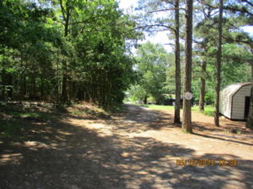 Looking for a getaway close to great fishing with no restrictions!!This would be a great place to park your RV and head to the lake for the day! It already has septic,electric and water on the property.There are also 3 bonus buildings on the property.