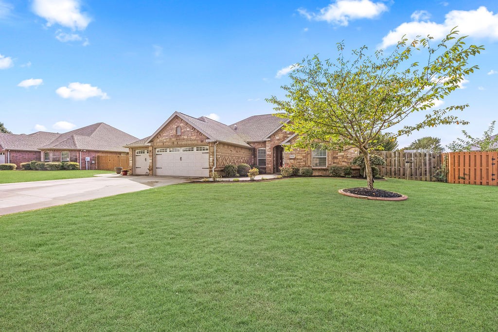 Exquisite home in the Riverwalk Farm Estates Subdivision! Wonderful open layout boasts quality upgrades inc granite counters throughout, and crown molding in main living areas. Delightful eat-in kitchen offers custom cabinetry, soft close cabinets, tile backsplash, ss appliances and beverage bar.
Separate laundry helps w/ functionality. Spacious bedrooms w/ split bedroom floorplan. Primary suite offers tray ceilings w/ mood lighting, large walk-in closet w/ built-ins, dual sink vanity, jetted tub and separate shower. Covered patio and fully fenced backyard provides the family the perfect place to unwind and play. Double gate for added access to yard. Added items for convenience: smart garage remote, fully decked attic space w/ 2500lbs winch, 60 gallon water heater and smart thermostat. Perfect location close to all of NWA amenities, w/ easy access to I-49. Less than 15 minutes away from XNA Airport and Bentonville Square w/ Walmart Home office just 10 minutes away. Come check this beauty out today!