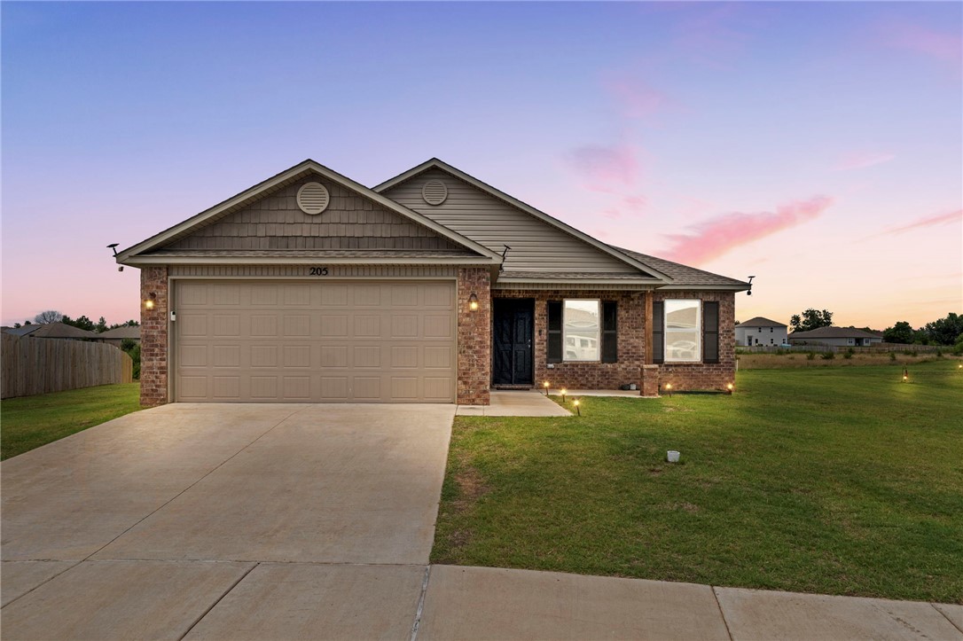 Welcome to 205 W Broadway St in Rogers—where modern living meets location and lifestyle! Built in 2023, this 3 bed, 2 bath single-story home offers 1,337 sq ft of open-concept space with upgraded ceiling fans, designer water fixtures, and a covered patio perfect for relaxing. One of the largest backyards in the neighborhood backs to open green space—no rear neighbors! Located minutes from Downtown Rogers, Lake Atalanta, the Railyard Bike Park, splash pads, and the Rogers Aquatic Center. Zoned for top-rated schools including Eastside Elementary and Kirksey Middle. Easy access to I-49, Pinnacle Hills shopping, dining, and entertainment. This is the perfect home for families seeking comfort, convenience, and community. Come see it today!