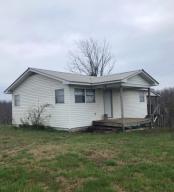 Located within a mile of the Ozark National Forest with thousands of acres for hunting and hundreds of miles of hiking trails.Easy access being only 3 miles off Highway 21 that runs along the Buffalo National River and the Boxley Valley. The property is surrounded by a large cattle ranch and the nearest neighbor is more than a mile. This little cottage would make a great starter house or retirement home. Lots of room for a garden and small orchard. Situated on the top of a high mountain with views in all directions.