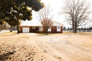 A truly rare find! This sweet country home is set on 30 acres of the most beautiful pasture. There is a barn for storage or animals and pleasant pastoral views from every angle. The charming home offers 3 bedrooms and 2 bathrooms. If you have ever dreamed of owning a little piece of paradise with a garden, animals, and plenty of room to breathe - this is your chance!!