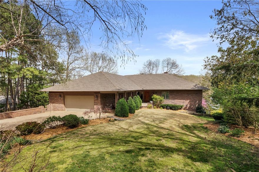 Beautiful custom built lake front home, landscaped, with lots of amenities and extras. Private Boat-dock and boat lift, Theater room, Game room, and Children's playroom. His and her hobby rooms, custom built wine cellar, Large office with lake views, sun room, eat-in kitchen with breakfast nook, Dining Room, living room, and family room. Beautiful Open and spacious decks, a private Master bedroom balcony. Whole Home Audio. Panic room (not pictured), several closets and storage spaces, wet bar upstairs and a full bar downstairs. You will love everything about this home. There is something for every member of your family, The quality of this build is second to none. A beautiful home in a beautiful city, on a beautiful lake! Must see it for yourself!