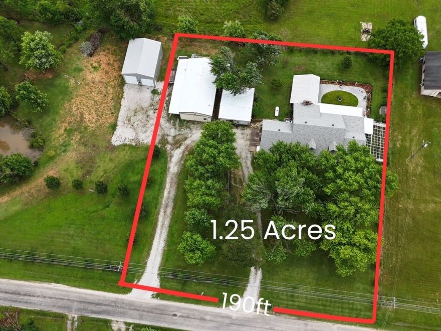Just off the interstate, this 1.25-acre property zoned C2 offers the perfect setup for residential, commercial, or mixed-use.  A 30x60 fully insulated shop comes equipped with heating, cooling, an office, and a half-bath—perfect for mechanics, fabrication, or woodworking. A second 30'x24' shop adds extra workspace or storage. 3-phase power is available at the road for heavy-duty equipment. 
Above the main level, a private-keyless entry 3-bedroom apartment includes a full kitchen, living area, and in-unit washer/dryer—excellent for rental income or multi-generational living.
The main home features an open living area that flows into a generous kitchen with ample counter space and storage. The primary suite boasts a large closet and custom walk-in porcelain shower. A flexible layout allows for an easy extra bedroom conversion. With a motivated seller, this property is a smart move for starting or growing your business—or expanding your investment portfolio.
Option to purchase RV bldg with additional 1.42 acres.