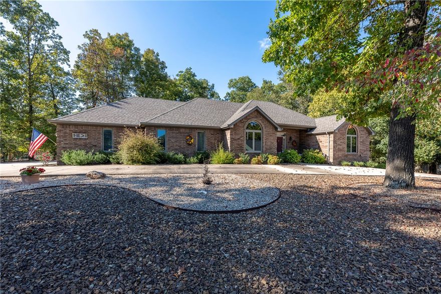 Welcome to this lovely & spacious 3-bedrm, 2.5 bath home nestled on a .58-acre lot w/ convenient circle driveway. Located just minutes from Lake Rayburn with easy access to scenic trails & Hwy 71B, this well-maintained home offers the perfect blend of comfort, functionality, & outdoor enjoyment.  Thoughtfully designed layout featuring a formal dining rm, enclosed sunroom, & office—ideal for working from home or hosting guests. The kitchen is a chef’s dream, showcasing custom cabinetry with slide-out shelving and a swing-out pantry system, offering both elegance & smart storage solutions.  Enjoy your morning coffee or evening relaxation on the expansive Trex deck, surrounded by mature trees that provide the perfect natural backdrop. Whether you're entertaining or unwinding, this outdoor space is sure to impress.  New Roof ’25.