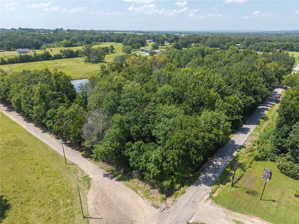 Donāt miss this rare opportunity to own 5 acres just minutes from town. This peaceful property offers the perfect blend of convenience and country living. Located off a paved road, it features a pond and is flat so its ideal for your dream home, hobby farm, or weekend retreat. Whether youāre looking to build now or invest for the future, this land has endless potential. Bring your vision and make it your own!