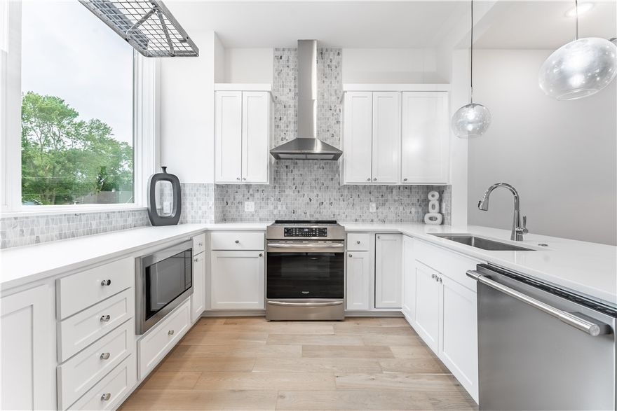 Luxury, location and income producing potential! Located just half a mile from the Bentonville Square, this residence is close to shopping, restaurants, entertainment & bike trails. This 3bed, 3bath, 1-car garage features beautiful hardwood floors, tall ceilings, modern windows and comes fully furnished. The seller is also offering a $5,000 credit which can be applied to buyer closing costs. Enter the residence from the front door to find a sleek foyer, bedroom, full bathroom & walk-in closet. A door separates the downstairs from the upstairs, which allows this space to be utilized as an income producing space. On the second level find the main living space with an open luxurious kitchen, dining room, living room and private covered balcony. Kitchen has an abundance of counter & cabinet space, stainless steel appliances and induction range to help make cooking a breeze. The third level features the primary bedroom suite, second bedroom with full bathroom & laundry closet. Residence can be short-term rental.