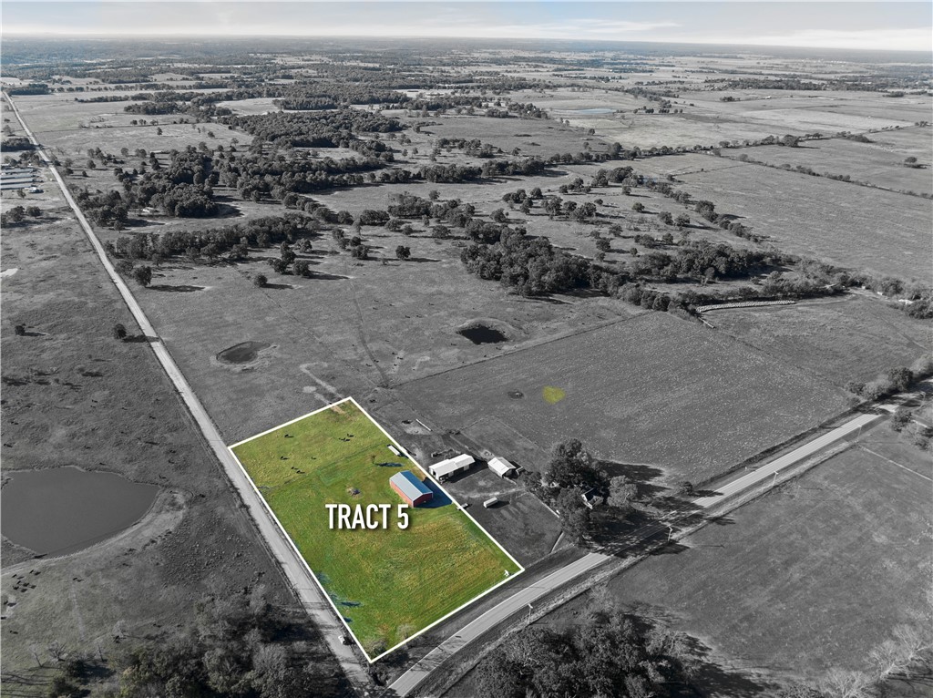 Tract 5 of 5: Conveniently located 5.2 acres off of HWY 72 and five minutes west of downtown Gravette.
The parcel is situated at the corner of Benson Road and HWY 72. The property provides ample ground to build a new home in the country with quick access to Gravette and surrounding NWA communities. Water and electric at street. Existing 40' x 75' red iron pole barn conveys with the property. Sellers willing to build to suit your New Construction Home, Barndominium or Shop House. No mobile homes. Lot line adjustement to be completed prior to closing.