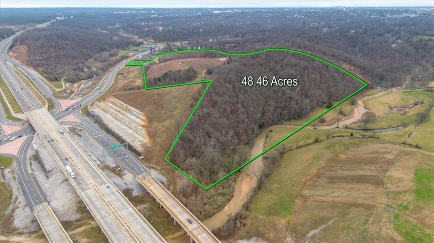 Premier location! Develop this iconic site and become a landmark that can be seen for miles from I-49 as well as the 1st spot to welcome traffic into Bentonville on Walton Blvd. Perfect for hotel, restaurants, resort style mountain bike destination, and more! Not only is this land on Walton Blvd, it is directly off of I-49 with 170 feet of Walton Blvd frontage and easy access to both The Greenway and mountain bike trails!