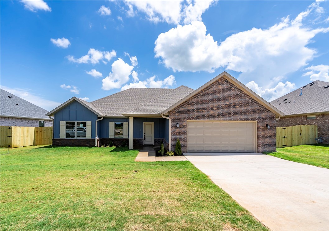 Welcome to this stunning new construction home that blends modern finishes with timeless comfort. Step inside to an open concept living area featuring vaulted ceilings, wood-look tile floors, and a cozy gas fireplace. The chef’s kitchen is a showstopper, boasting granite countertops, stainless steel appliances including a gas range, a striking dark island with seating, and a lovely tile backsplash. The primary suite offers a tray ceiling and a spa-like bathroom with dual vanities, a marble-look walk-in fully tiled shower, soaking tub, and a huge walk-in closet. Enjoy a fully fenced backyard with a covered patio—perfect for outdoor entertaining. With spacious guest rooms, upscale finishes throughout, and a two-car garage, this home checks all the boxes for comfort and style. Home also comes with blinds and gutters.