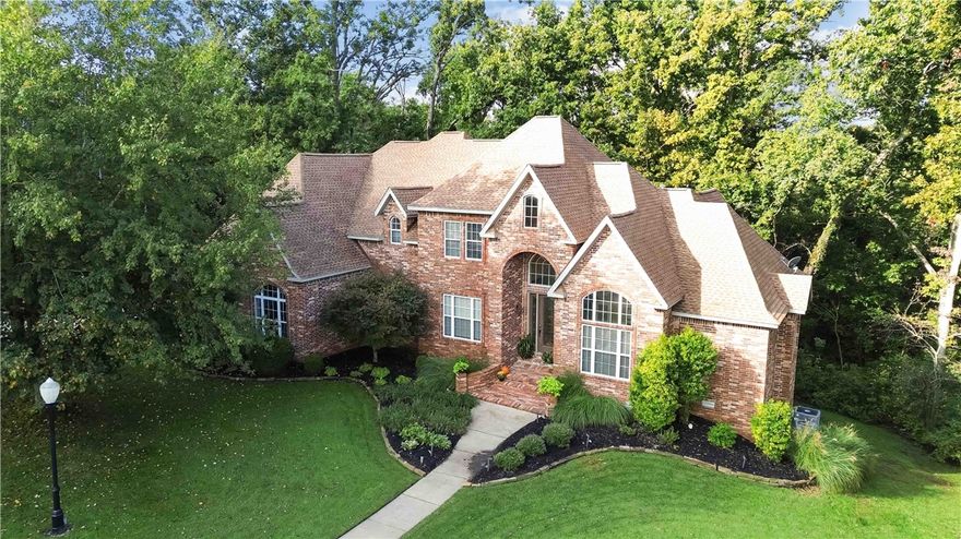 Classic Bentonville Home.  Lifestyle & Location.  Discover timeless elegance at 219 Ridgefield in Bentonville’s Hanover neighborhood. With 5,579 sq ft of living space, this home offers a perfect blend of tradition and comfort. From spacious living and dining areas to inviting rooms designed for gathering, every detail reflects quality and charm. The luxurious primary suite provides a relaxing retreat, while the home’s thoughtful layout offers space for both everyday living and entertaining. All just minutes from trails, parks, schools, and the vibrant heart of Bentonville—this is truly a classic home in a classic neighborhood.