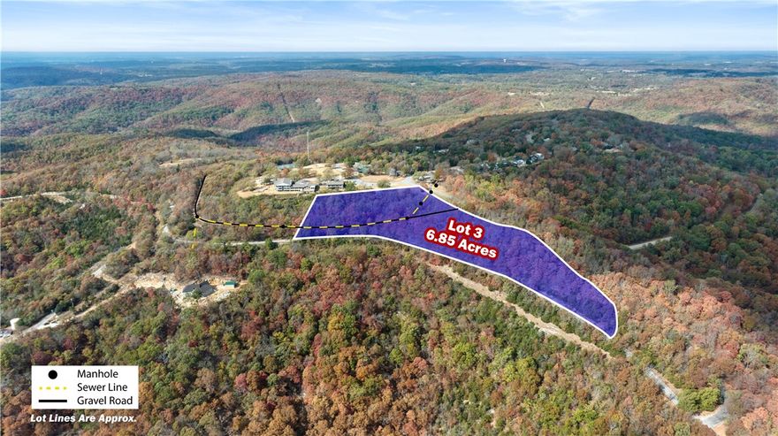 A rare opportunity to acquire +/- 6.85 acres with breathtaking, year-round views of Beaver Lake from one of the highest elevations in Benton County at 1,800 feet. Overlooking 487 miles of shoreline, this premier homesite or development tract offers exceptional topography and panoramic scenery that is increasingly difficult to find.  All utilities are readily available on site, enhancing the property's development potential. Situated in the county with no official zoning, the site allows for a wide range of uses, including residential estate, short term rental cabins, retreat concepts, or future investment hold. Conveniently located just 1.7 miles east of Lost Bridge Marina and 2.7 miles west of Beaver Lake Sail Club, the property also offers strong regional connectivity. It is approx. 20 minutes to Rogers Executive Airport and 35 minutes to the new Walmart World HQ. This is a standout opportunity to secure a piece of highly desirable land in one of NWA's most sought after lake areas.