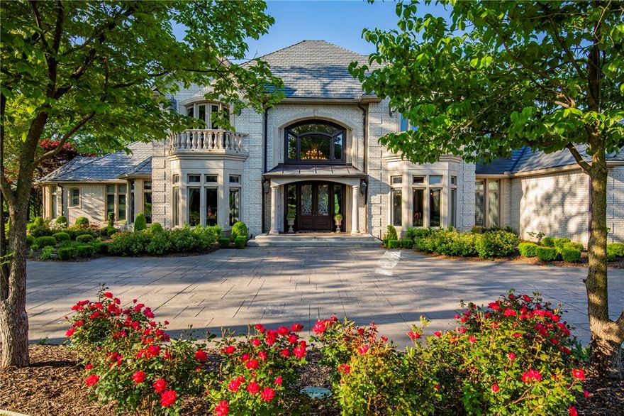 Discover the finest home Pinnacle Country Club has to offer. This home was built on two original estate lots that were combined to become an astonishing 1.71-acre golf front estate. Entering the grand Goyer, you're welcomed by an incredible spiral staircase, crystal chandelier and hand scraped hardwood floor inlaid with marble. This home boasts a voluminous kitchen, office with a private study & discrete spiral staircase leading to a library on the second level, a craft room and a media room with a wet bar. The master suite features a fireplace, walk-in closet, exercise space and private access to the outdoor spa. Experience panoramic views from your own oasis, enjoying the pool & private cabana with a half-bathroom and a fireplace. Imagine your own workshop or workout room in the 1249 heated & cooled square foot finished basement, (this is not included in total sq footage.) This home has it all. Don't miss this rare opportunity to live on the largest estate lot in the exclusive Pinnacle Country Club.
