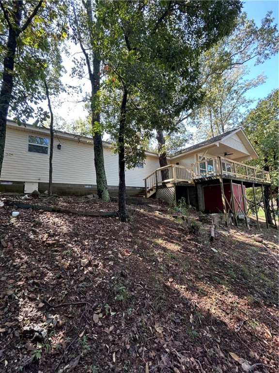 Beautiful lakefront home located in the peaceful Adams Lake Loop community of Conway. This charming residence features 2 bedrooms and 1 bathroom, with spacious living areas and an open floor plan. The updated kitchen includes modern appliances. Enjoy outdoor living on the wrap-around deck overlooking the water, perfect for relaxing or entertaining. Ideal for anyone seeking a serene waterfront retreat in a friendly neighborhood with great Airbnb potential. Lake renovations project is under way by the AGFC. With major improvements to aid with improved fishing, clear boating lanes, and greater vitality of Lake Conway. True Lakefront Properties in this condition do not come up on the market often. Don't let this trophy slip through your finger tips. Thanks for viewing.
