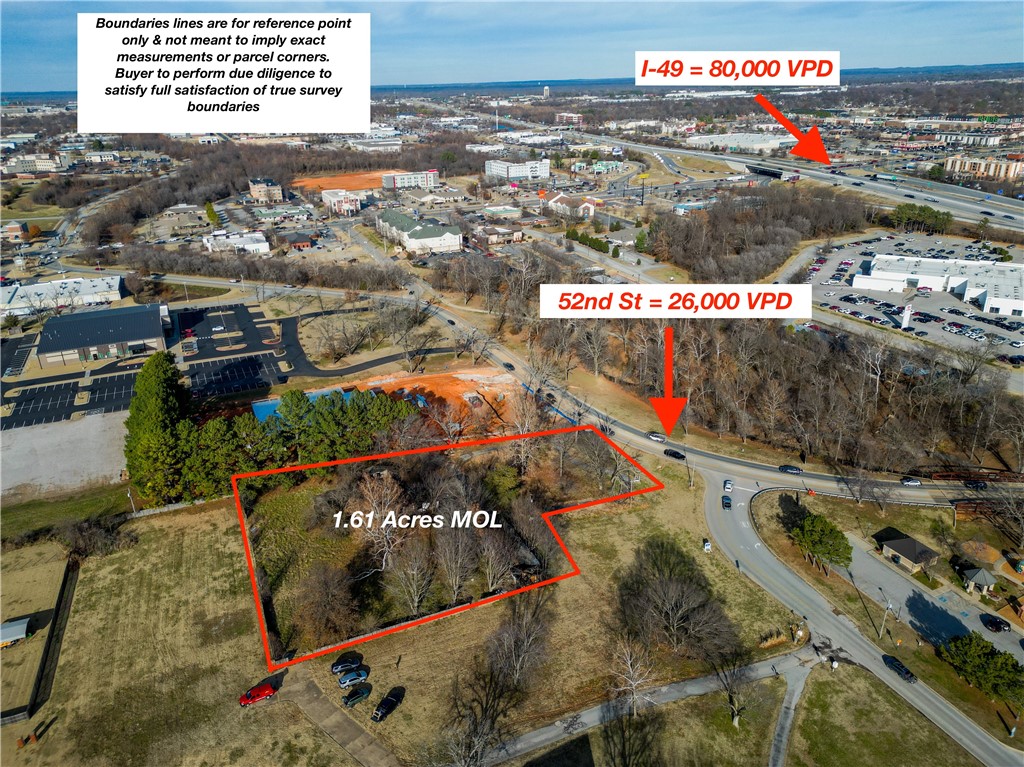 One of the top Commercial locations in ALL of NWA ! At just over 1.6 Acres, this premium opportunity boasts 5-Star buildable topography, traffic count (80K VPD on I-49 & 26K - VPD on 52nd St), visibility and multiple zoning options. Neighboring properties are zoned RO, C-3, Class-A office space, as well as Multi-Family. So, if you need it, it can be done.
Seller attributes no value to structures on site.
NWA is a Top-5 Real Estate investment opportunity in 2024 according to the National Association of Realtors. This is premium dirt, that is ready to grown your wealth.