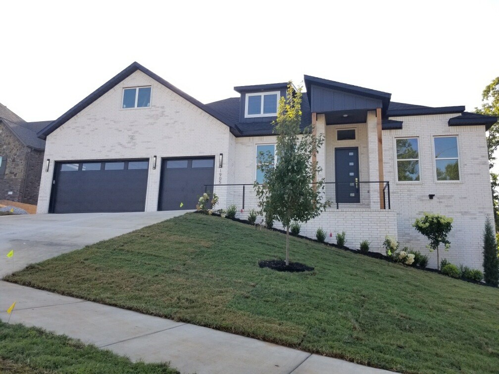 Stunning 5 bed, 5 bath home with approx. 4,025 SqFt and a 3-car garage featuring 13-ft ceilings and 8-ft tall doors. Includes 2 living areas, media room (pre-wired for projector & 7.2 surround), office, wet bar, and two 10x22 covered decks. Living room boasts 12-ft ceiling, electric fireplace, and accent wall. Formal dining room also features accent wall. Kitchen offers LG appliances, gas cooktop, vent-out hood, built-in microwave & oven, plus a coffee bar. Home is well-lit with 8-ft tall front door. Bathrooms include 2 standing showers and 3 tub/shower combos with 36” tubs, plus built-in storage. LVP flooring throughout with moisture barrier, stairs with wood posts and metal cables. Outdoor gas grill hookup. Spacious 100x100 backyard—plenty of room to entertain or relax!