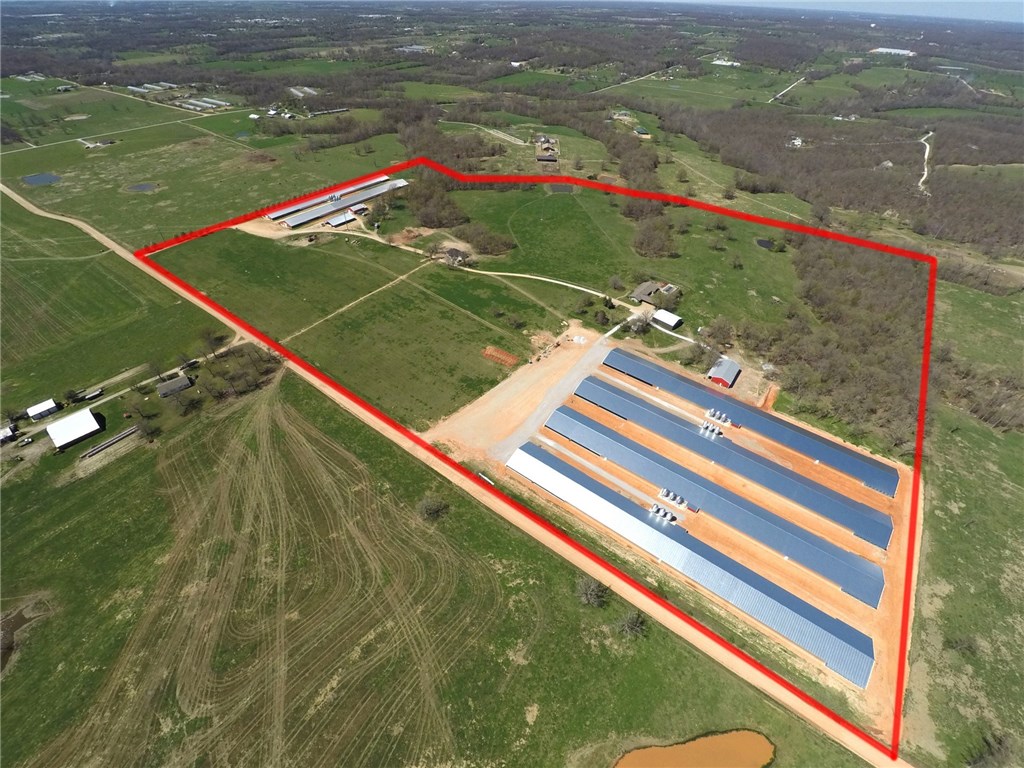 Brand New (6) 66 x 600 broiler farm on 80 acres with to many extras. Poultry houses are 1 & 2 years old. Large stacking sheds with shop/well/generator buildings. 2 Eco drum compost system. Large main 3058 square foot 5 bedroom 3 bath main house with in ground pool and large new insulated shop/garage. 2nd dwelling is new 3 bedroom 2 bath brick home. Tons of extras and room for more houses. A show place.