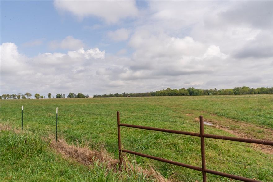 Acreage near XNA provides endless potential! Level land in fast-growing area is perfect for residential development, small farm or cattle operation, or commercial use. This prime location plus open possibilities equals a smart investment, offering a blank canvas to your vision, whether you want to farm, develop or invest in the future. Coming soon is Hwy 612 which exits at the XNA entrance making this property easily accessible to all of NWA.