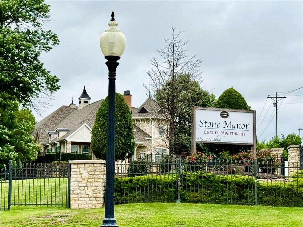 Luxury Condo in the highly sought after Stone Manor Gated Community. The interior of this condo has been thoughtfully & elegantly refreshed from top to bottom! Every detail reflects taste & quality with modern updates waiting to delight you! Featuring a split-bedroom floor plan & a central living area separating the two bedrooms. The open-concept living, dining, & kitchen space serve as the hub of the home, creating a balanced layout offering a great gathering space as well as providing privacy for each bedroom suite. Ideal for guests, home office flexibility, or roommates. Located in a secure, gated community, this property offers a wealth of amenities & direct access to the Razorback Greenway Trail System. Whether you're commuting, exploring the outdoors, or enjoying local entertainment & shopping, this location puts it all within easy reach. Minutes from I-49, Downtown Rogers, Uptown Rogers, the Walmart AMP, Pinnacle Hills Promenade, and a quick drive to Bentonville's vibrant downtown & corporate campuses.