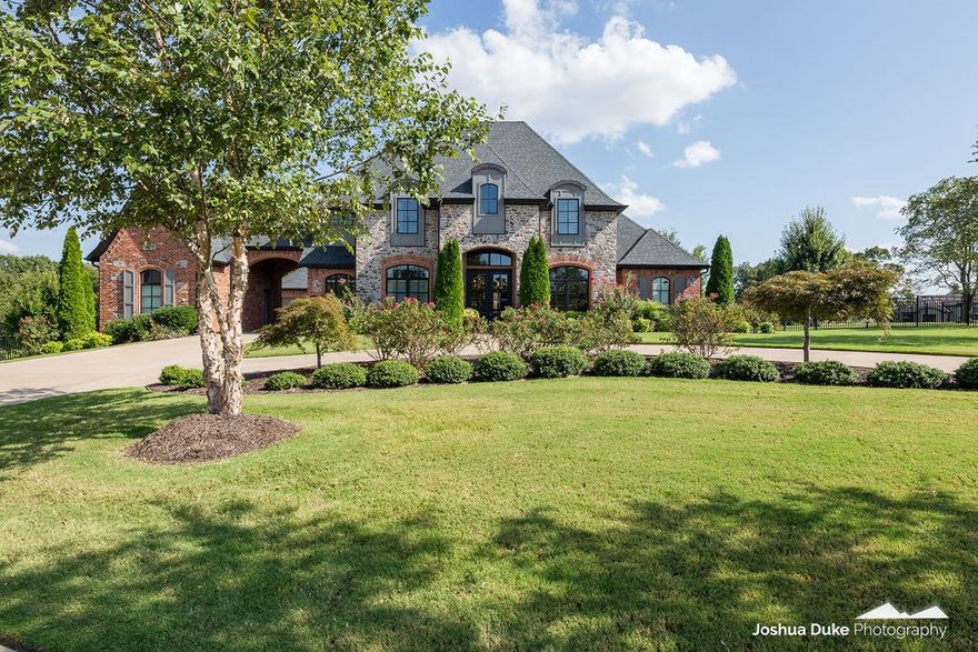 Awesome home in West Fayetteville’s Estates @ Dogwood Canyon. Sits on a 1.29 acre lot.  4,018 heated sq ft includes 4 bedrooms all w/private bathrooms, formal dining, study,  oversized living room open to eat in kitchen, & bonus room. More amenities include a  3 car garage w/portico, hardwood floors, tiled showers, 6 burner gas range w/pot filler, brand new insulated garage doors, wrought iron fencing, outdoor fireplace & composite deck.  Seller installed an in-ground heated Burton Pool in 2017 w/gorgeous landscaping & a gas firepit.