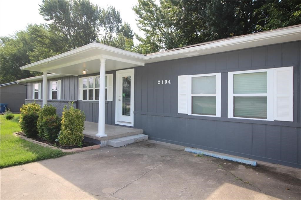 On Hwy 102 (SE 14th) directly across the Street from the NEW Walmart Campus! High traffic count of over 35,000 cars per day. 6 Offices 1.5 baths, Reception area, Full Kitchen, additional parking in rear. Lots of potential for small Business. 2 Block west of I-49. Can be leased as a residential unit as well.