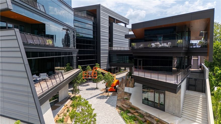 Welcome to Midtown Lane, Bentonville’s premier 175,000 SF mixed-use building in the heart of downtown. Designed with bold architecture and high-end finishes, this Class “A” property offers an unparalleled blend of world-class design and local charm. The ground floor features retail spaces with patios, while the upper floors boast office spaces with balconies, combining indoor luxury with outdoor appeal. Located just steps from the Bentonville Square, Midtown Lane is surrounded by top-tier restaurants, unique shops, and MTB trails. Amenities include secured parking, keyfob access, and outdoor patio options for every space. Purpose-built to match the energy of downtown Bentonville, Midtown Lane fosters connection, collaboration, and growth. Discover Bentonville’s most exclusive office address—where professionals flourish.