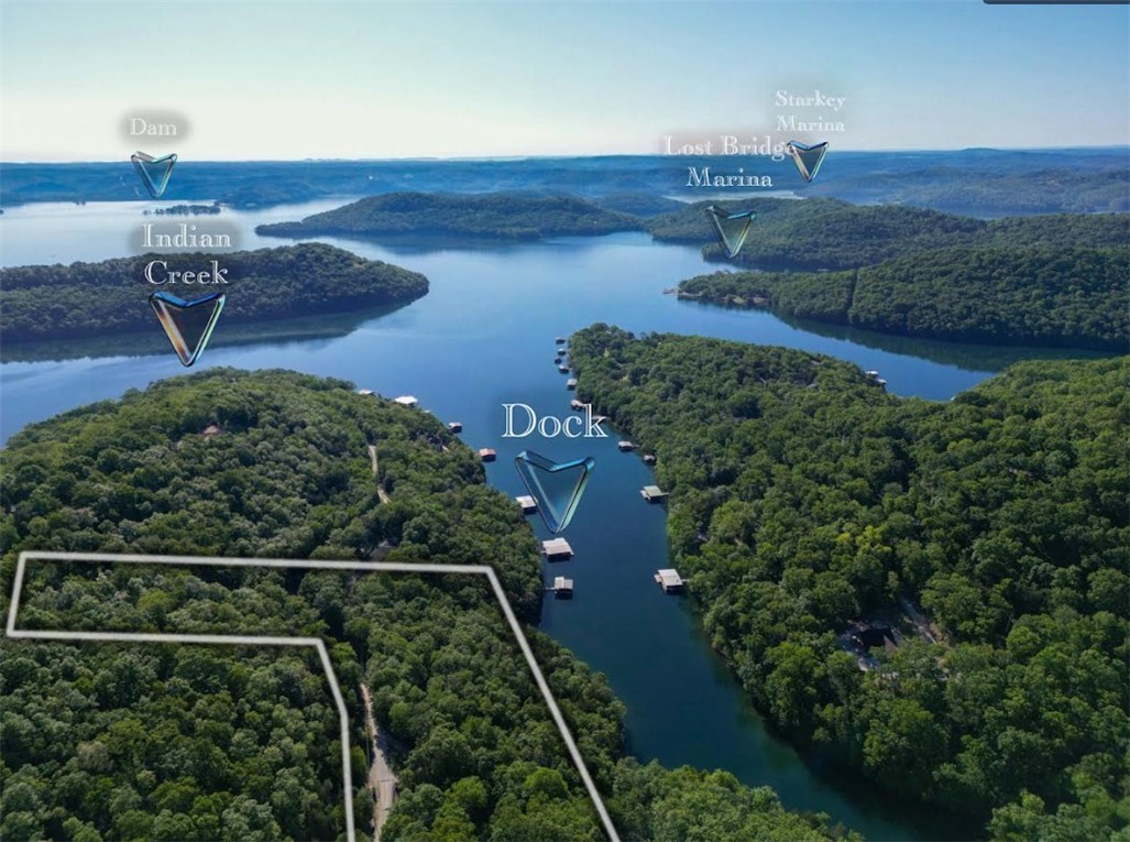 A rare opportunity to own 3.33 acres of lake-front property on the NW side of Beaver Lake with your own 10ā x 26ā boat slip in a deepwater cove. Easy access to NWA. No traffic near the end of Sloan Hollow Road. Buildable site with all the utilities in place (electric at road, 208ā deep well that produces 37 gpm, and an installed and permitted 4-bedroom septic system). Boat slip is part of a 6-slip community dock. Absolutely beautiful area that rivals anywhere in the world. Donāt miss out on this opportunity.