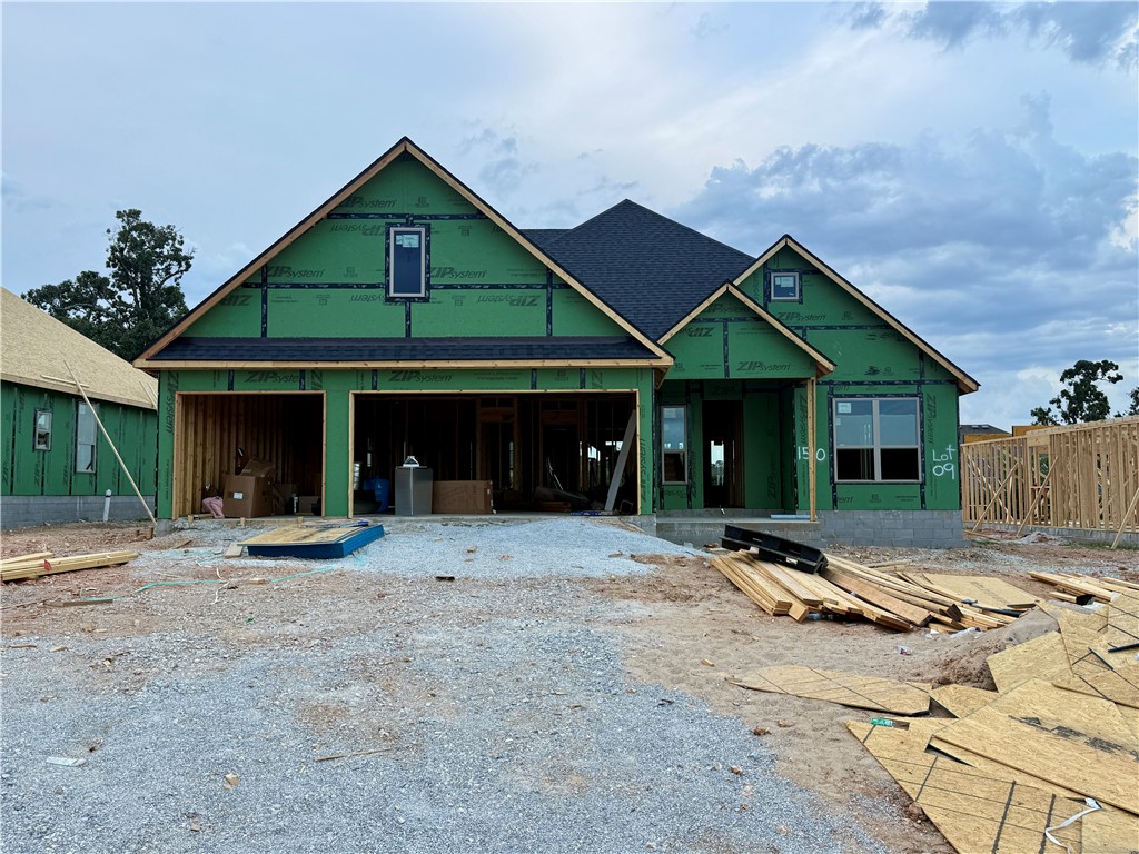 At Hillcrest in Cave Springs, enjoy a private, peaceful setting with the benefit of being only minutes from all that Northwest Arkansas has to offer. This stunning new construction offers 4 bedrooms, 3 baths, and 2,310 sq ft of thoughtfully designed living space. Located on a .19-acre lot in the desirable Hillcrest Subdivision within the Rogers School District. The open-concept layout features wood flooring, abundant natural light, and a cozy fireplace in the family room. The kitchen includes a gas cooktop, quartz countertops, and a spacious pantry. The primary suite boasts a soaking tub, walk-in shower, and large walk-in closet. Three additional bedrooms and two full baths provide plenty of space for family or guests. Additional highlights include a 2-car attached garage, covered back patio, and fenced backyard.