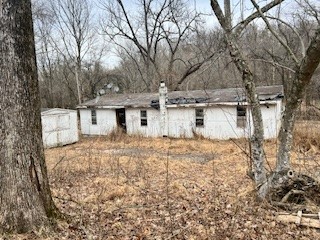 Investment opportunity. Beautiful area with year round creek running behind the lot. The current home has been gutted and needs some TLC or you could clear the house and build the your dream home. Lots of opportunities! Property is being sold AS-IS.