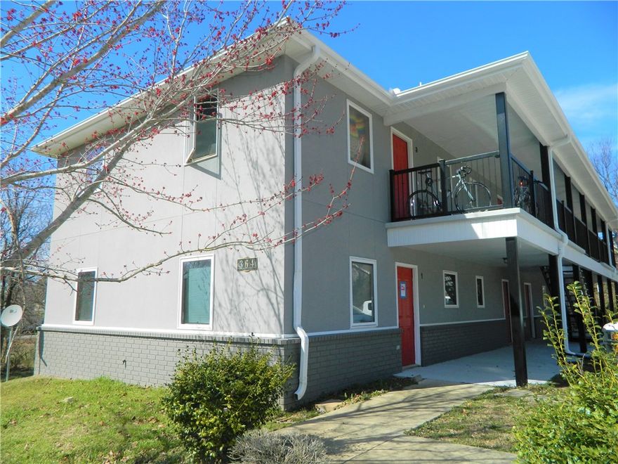 Fully leased South Fayetteville investment with good rental history and several updates and renovations made through current owner.  Promising complex of 7 units in booming South Fayetteville just over a mile direct line from the University of Arkansas campus in the heart of this area of impressive growth and revitalization. Each unit is approx 1180 SF with its own W/D and 6'x6' storage with exterior access. Seller has invested in continual improvement replacing appliances and flooring as tenants turned over as well as new water lines and fencing in 2020.  
Two parcels and two buildings, acreage is estimated from county record.