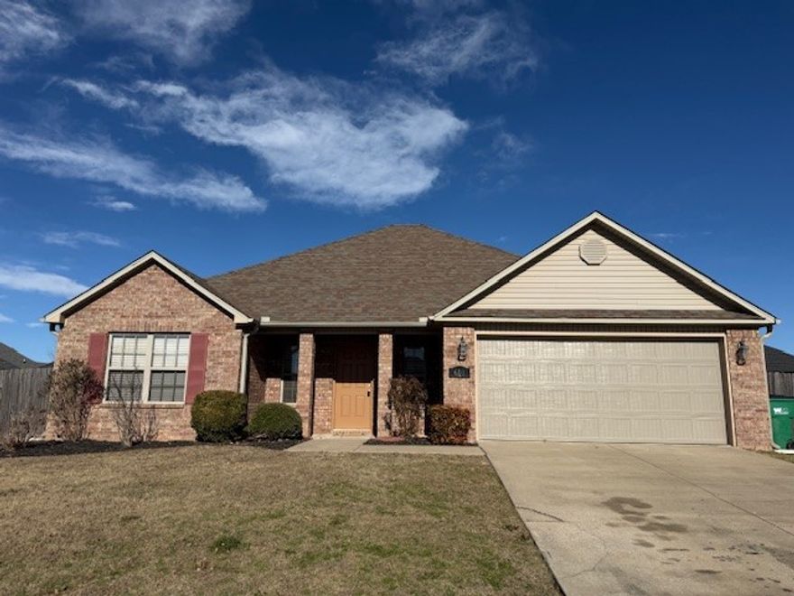 One level 4 bedroom 2 bath single family home with a split floor plan in Char-Lou Subdivision. Large living room with vaulted ceilings opens to the spacious kitchen. Kitchen offers new range and dishwasher with a hooded microwave with refrigerator included. Large primary bedroom with ensuite and spacious walk in closet. Primary bathroom has jetted tub and separate shower. Wood style flooring through living room and bedrooms. Two car attached garage. Large fenced backyard. Apply at PrimeNWA.com