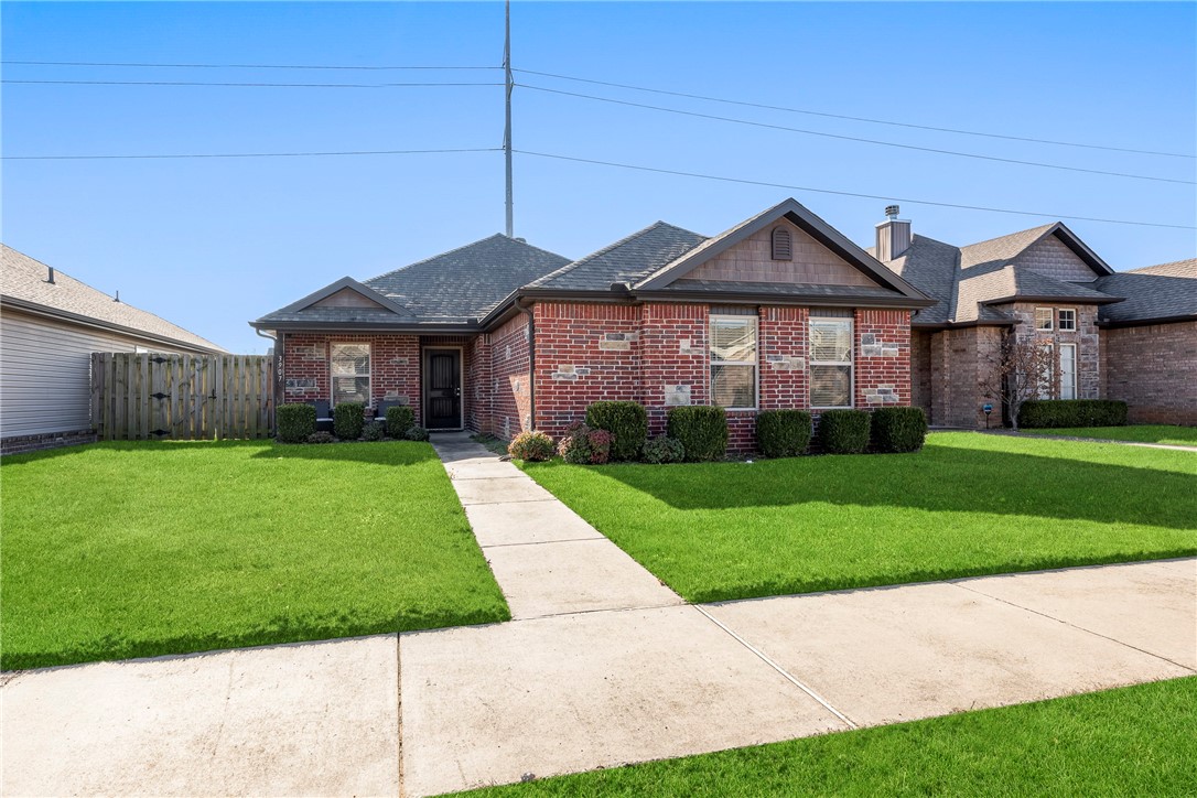 Great starter home! Fully furnished. Excellent potential for long or short term rental. 2015 well maintained and like brand new home in a desirable location. Within walking distance of schools. Minutes away from downtown Bentonville, trail system, shopping, and I540 for easy daily commute. Home features; 3 Bedrooms, 2 Bathrooms, Utility Room, 2 car garage, & patio off side of home. Living Room with vaulted ceiling and open floor plan. Eat-in kitchen features granite counter tops, double stainless sink, & pantry. Primary suite features vanity w/ full mirror and enormous walk-in closet. Vinyl & brick maintenance free exterior.