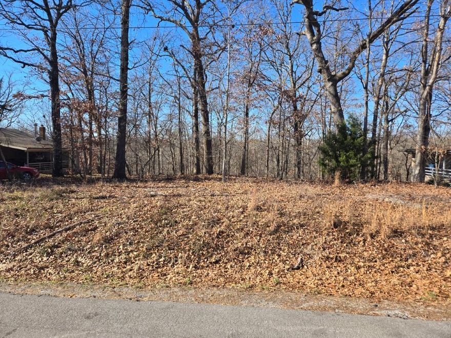 Ease of access to I-49 and access to the Back 40 Trailhead that is less than a mile away. Take advantage of this mostly level wooded lot located near several nearby amenities that include lakes, trails, recreation centers, and golf courses.