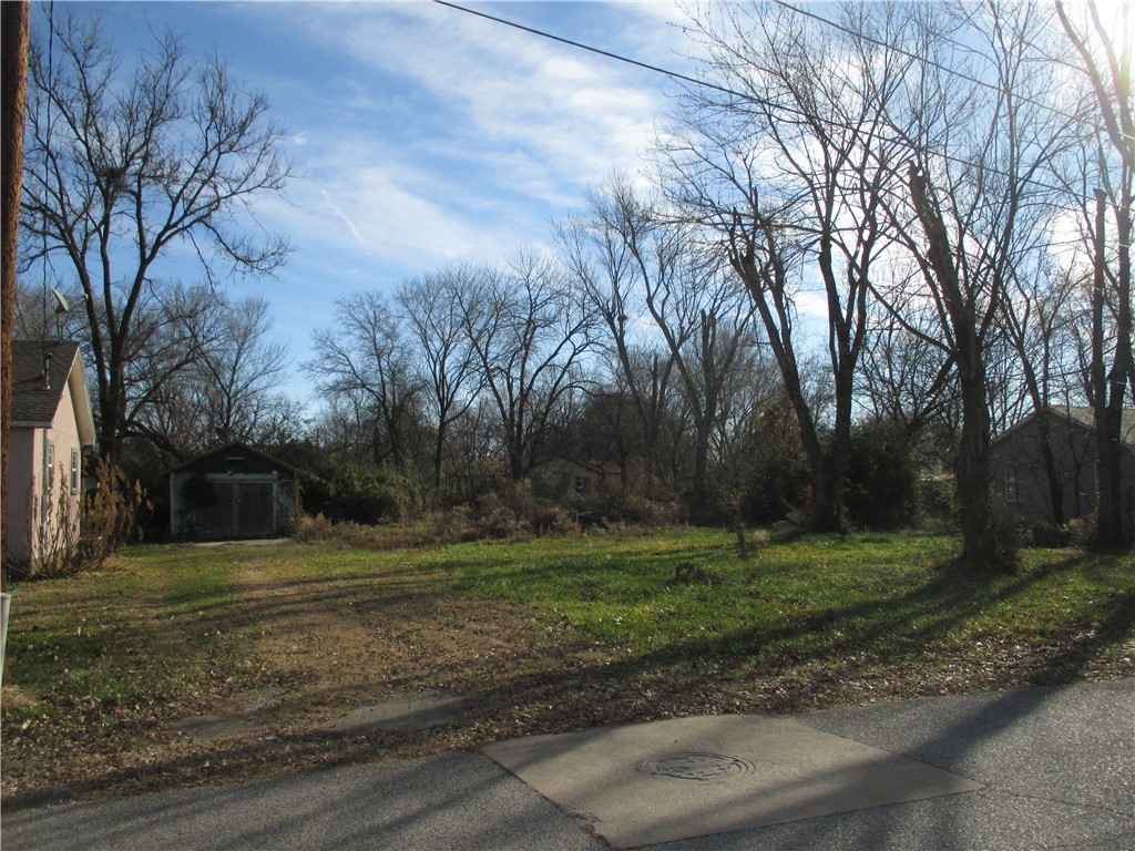 Opportunity knocks! This .32 acre lot is in a great location, just SE of the Oak & Arkansas St roundabout & Monte Ne Rd, near city parks, trails and downtown Rogers amenities. All utilities at street. Zoned R-DP (Residential Duplex & Patio Home). Sold As-Is. Make an offer!