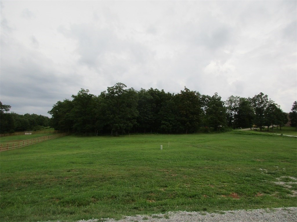 Beautiful subdivision in excellent location! 2 acre lot with all city utilities. Nice views, beautiful new homes all around. Minutes to Springdale, Rogers, or Fayetteville. Build your dream home here!! Only 2 lots left!