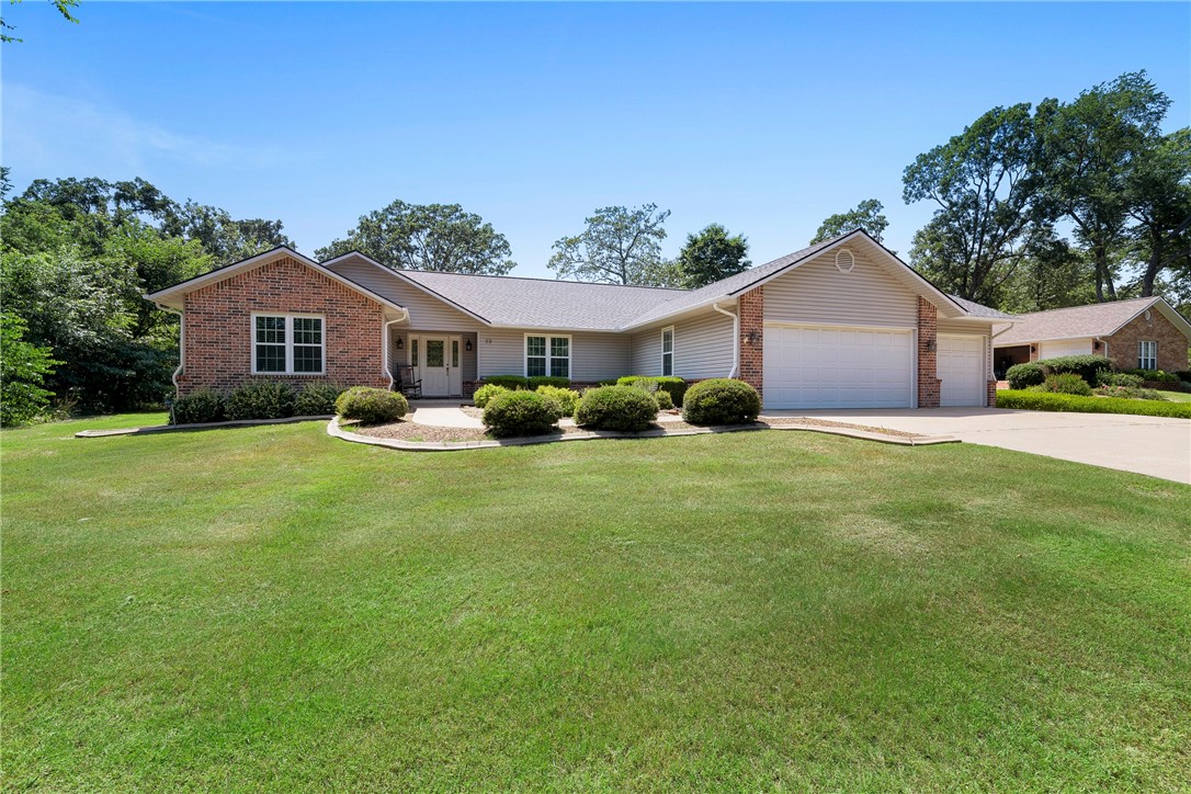 2000 Built home located on 17th fairway of Highlands Golf Course. New 2022; septic pump. New 2021; stove. New 2020; kitchen & bathroom floors, disposal. New 2019; roof, home pressure washed. New 2018; hot water heater, refrigerator. New 2017; windows & sliding glass doors. New 2016; microwave, pergola. New 2014; attic energy shield installed over living area, Bosch dishwasher. Home features: 3 bedrooms, 2 bathrooms, split floorplan, 2160 square feet, sunroom, living room (w/ vaulted ceilings & gas log fireplace), formal dining, kitchen (w/ pantry & granite countertops), Master suite (w/ double walk-in closets, whirlpool), 3 car garage w/ attic storage, utility room, patio covered w/ pergola, level yard, firepit, mature/professional landscaping, sprinkler system, 12x14 shed. Easy access to Hwy 1540 & Hwy 71 for easy daily commute. Curtains do not convey. 2 Bedroom septic.