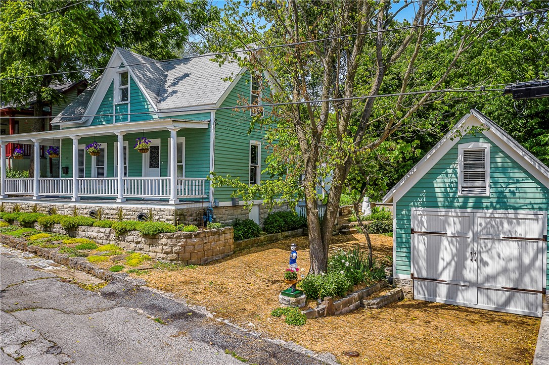If you are searching for a charming cottage with tremendous curb appeal on a quiet street off the upper Historic Loop, you may have just found it! Easy walk to the heart of downtown! Main house, circa 1892, features 2 bed and 1 bath. Detached Studio, approx. 280 sq. ft, has been recently completed and includes a fantastic full bath and kitchenette. Delightful garden with meandering pathways add to the appeal of this enchanting home with a storage/gardening shed. You will feel a "great vibe" in this home that has been lovingly maintained and restored by the current owner of 18 years. Come live the "Good Life" in Eureka Springs.