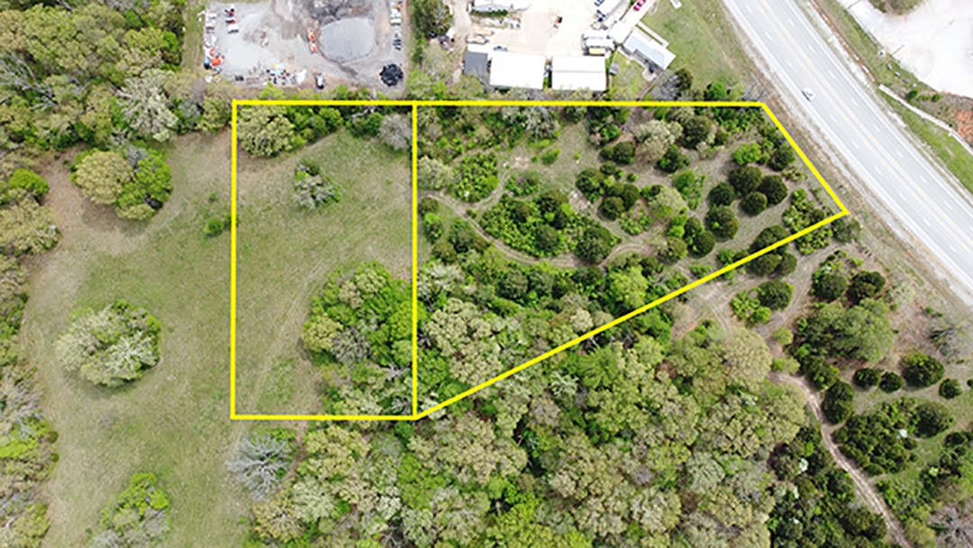 LEVEL 5.21 Acres with Hwy 62 frontage near Hwy 72 junction, only 15 minutes to downtown Rogers and Hudson Rd/Hwy 102. Front parcel is 2.85 acres adjoining the interior back 2.36 acres which is mostly cleared and surrounded by mature trees. This beautiful property has many possible uses with no covenants, from residential to commercial or live/work combination. Survey attached showing both parcels and ingress/egress easement. Buyer responsible for due diligence in verifying utility and county information.