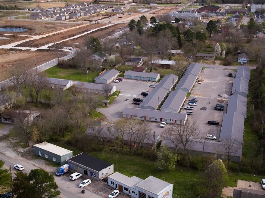 Turn-key investment opportunity featuring 60 fully remodeled 2 bed, 1 bath units in south Fayetteville. With prime location just minutes from the U of A, Walker park, some of Fayetteville's most iconic food spots, and the Razorback Greenway, these flats offer tenants convenience and comfort. So much has been remodeled...new roofing, all new gutters, exterior and interior paint, luxury vinyl plank flooring, subway tile backsplash, all new energy efficient windows to name a few. With most capital expenditures already covered, enjoy a stress-free cash-flowing investment. Tenant pays for main utilities plus trash.