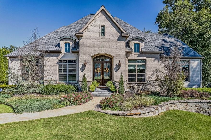 Discover unparalleled luxury in this stunning 5-bedroom, 8-bath estate home nestled on a sprawling 1-acre lot in the private, gated community of Pinnacle. Elegantly designed, this home boasts a grand entry, expansive living spaces, and exquisite finishes throughout. The chef’s kitchen features marble countertops, a large island with prep sink, and top-of-the-line appliances including a Wolf gas range and Sub Zero refrigerator. The spacious master suite includes a spa-like en-suite and custom designed walk-in closet. Additional bedrooms offer private baths. After a long day on the golf course relax in the home theater to watch a movie or step outside to your personal paradise: a pristine saltwater pool, relaxing spa, and lush landscaping that creates an idyllic setting for relaxation and gatherings. The charming guest house ensures comfort for visitors with its own living area, full kitchen, and bath. This home combines sophistication and comfort, offering a perfect balance of luxury and privacy.