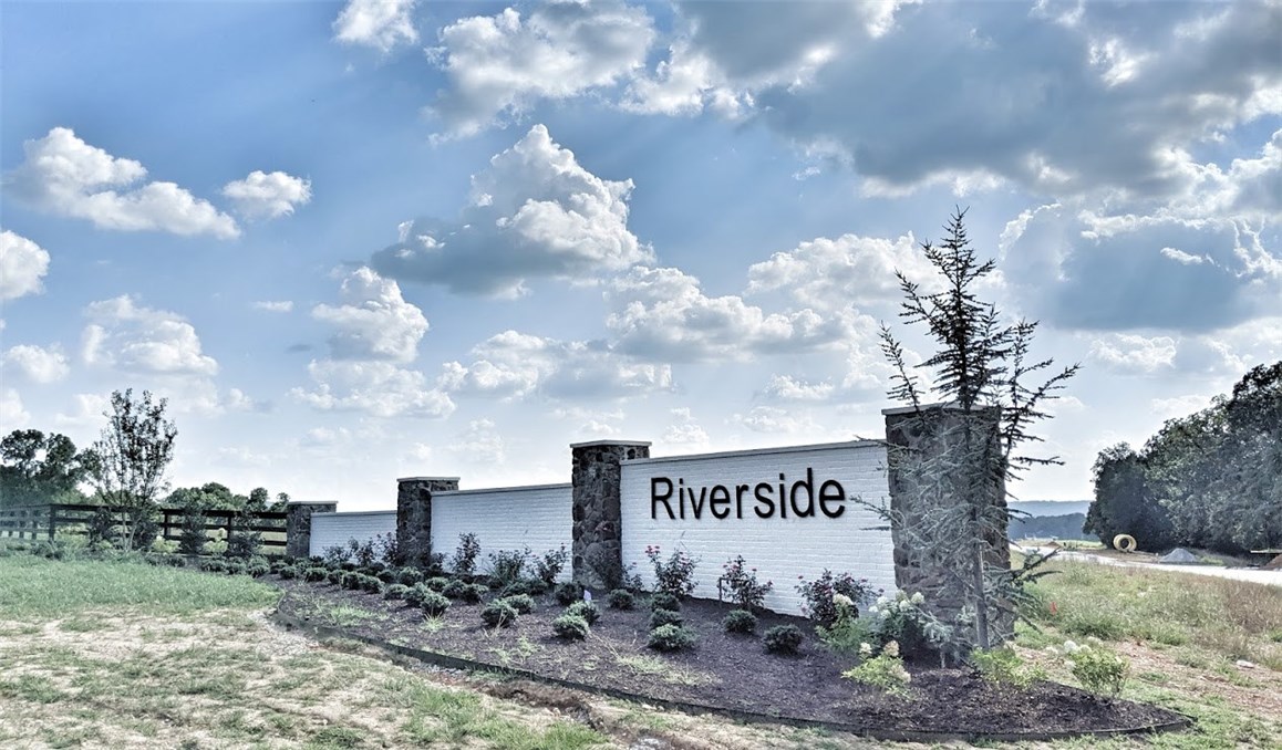 Welcome to East Fayetteville and Goshen's newest subdivision RIVERSIDE ESTATES. This lot is flat and open with trees at the back line overlooking the white River. The subdivision will feature, white river access, Fayetteville School district, Community Tennis court. There will be a 3200 sq.ft. min for houses call now for more information.