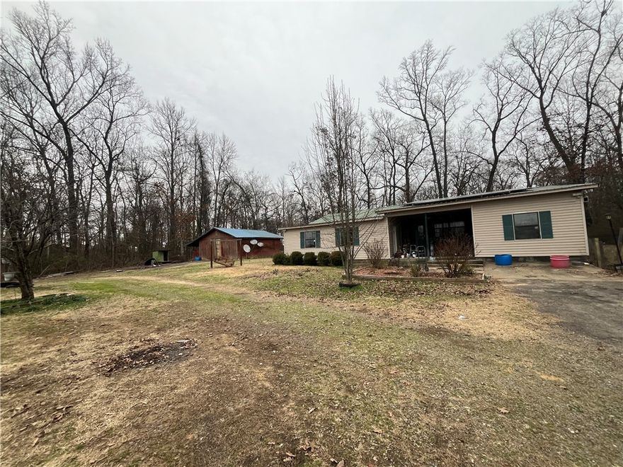 3 Bedroom/1.5 Bath Home PLUS an Extra Bonus Room that could be used as a 4th Bedroom or an office space (with another half bath), all on One Acre. This house also has a Large Den with a Fireplace and a Large Pantry off the Kitchen.  Come Check it out!