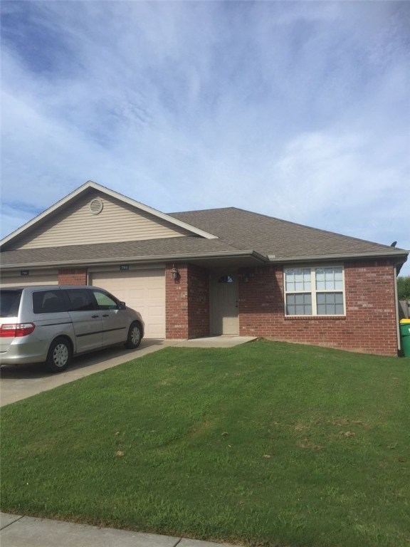 This is one of the newest duplexes in the subdivision. Has beautiful tile and darker walls and cabinets. Very well maintained. Each side has 2 bedroom, 2 bath, 1 car garage and a privacy fenced yard. Both sides are rented for $750, one side tenant has lived there for years, the other on their first, one year lease. Great Investment property!!!
