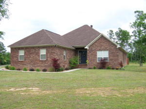 Gorgeous home with a country setting, but still convenient to town! This stunning 2413 sf home offers a great floor plan including a large kitchen with an island full of storage, open formal and informal dining areas, beautiful wood floors and a nice master suite with a jetted tub and a walk in shower. The laundry room has wonderful storage and there's even a small office! All this on 1.41 acres!