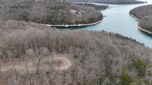**Parcel# 15-02143-000 is contiguous and also for sale** Seasonal lake view lot surrounded by luxurious homes and views of Beaver Lake. Just minutes from Lost Bridge Marina and the lost bridge North / South Campgrounds, this lot is part of the Lost Bridge Village Community Association and comes with access to the community pool, pickleball courts and recreational center with waterfront access. Enjoy the lake life while being only 25minutes from downtown Rogers and everything Northwest Arkansas has to offer.