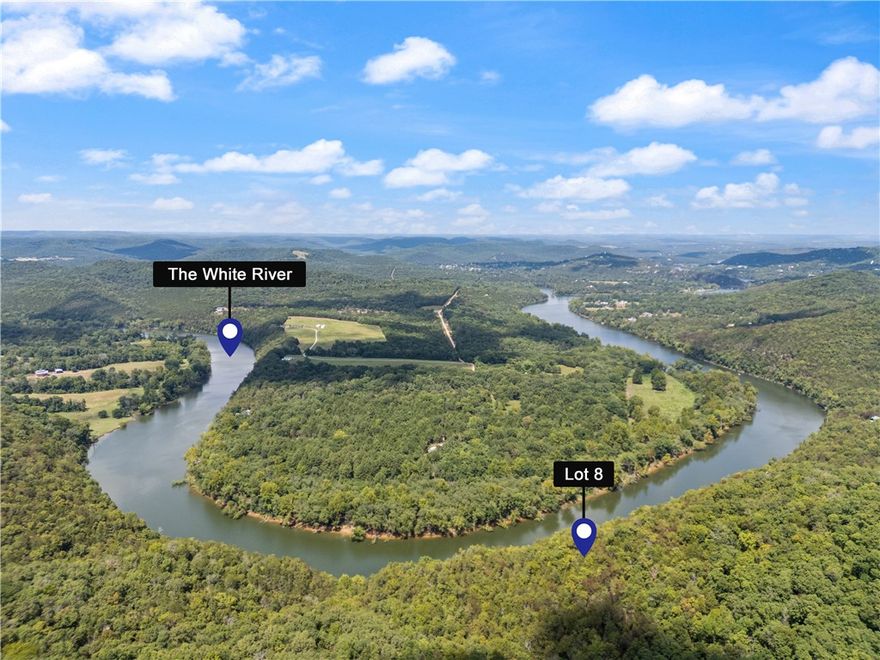 Large wooded land overlooking and fronting the White River.  Located only a couple miles from the new Opera of the Ozarks. Just minutes from beautiful downtown Eureka Springs.  Trout Fish on the White River, great Bass fishing on both Beaver and Table Rock Lakes, all just minutes from the property.