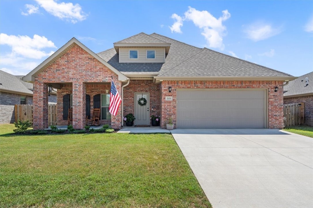 Welcome home to your beautifully finished and thoughtfully designed floorplan with space for the whole family to spread out. The first floor features a large living room beaming with natural light and an electric fireplace to cozy up to on cold winter nights. The living room flows into the open dining area and conveniently located half bath. The spacious kitchen has stylish black stainless steel appliances and a large walk-in pantry. The primary bedroom is located on the first floor with an ensuite bath with double vanities, a large soaking tub and walk-in shower. The primary closet flows effortlessly into the laundry room for ultimate accessibility & convenience. The 2nd floor has 2 additional bedrooms, a full bathroom and a flex space ideal for a play area, side hustle or office needs. The backyard boasts a covered patio with a 10'x20' extension. Artistic details and upgrades added throughout!