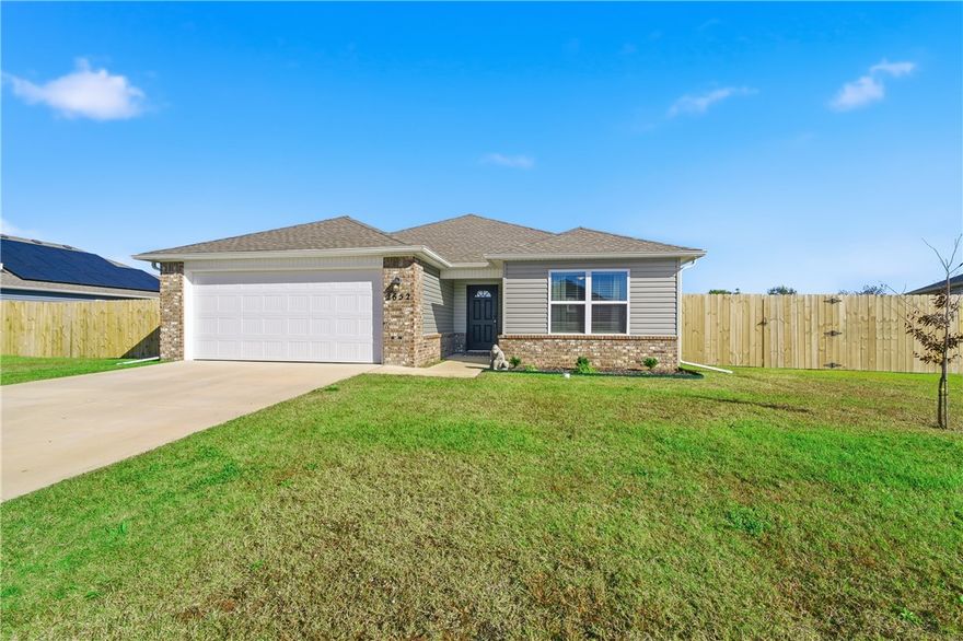 Super cute home in a newer neighborhood with all the modern touches! This home features beautiful granite countertops, updated light fixtures, and durable LVP flooring throughout the main areas. The open floor plan offers great flow between the kitchen, dining, and living spaces. Perfect for everyday living or entertaining. Enjoy peaceful views from your backyard that backs up to a retention pond with no neighbors directly behind you. Located in a growing community where you can even get Walmart drone delivery! Convenient to schools and major roads, this home combines comfort, style, and a little modern convenience you won’t find everywhere.