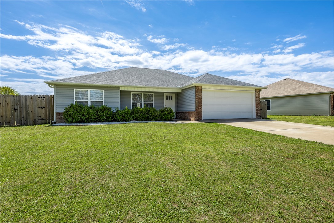 Discover the perfect mix of country calm and city convenience in this cute home with a split floor plan. The kitchen is ready for your cooking adventures with modern appliances and a pantry, opening up to the living area. The primary bedroom is a peaceful oasis with lots of light, a big closet, and a great bath with double sinks and walk-in shower. With two extra bedrooms, there's plenty space for everyone. Outside, the big fenced yard faces south, perfect for hanging out, and the patio is just waiting for your personal touch. A quick drive to various spots in NWA and in the Rogers School District, this home qualifies for a USDA loan with no down payment, making it super easy to own. Don't miss outāschedule a viewing.