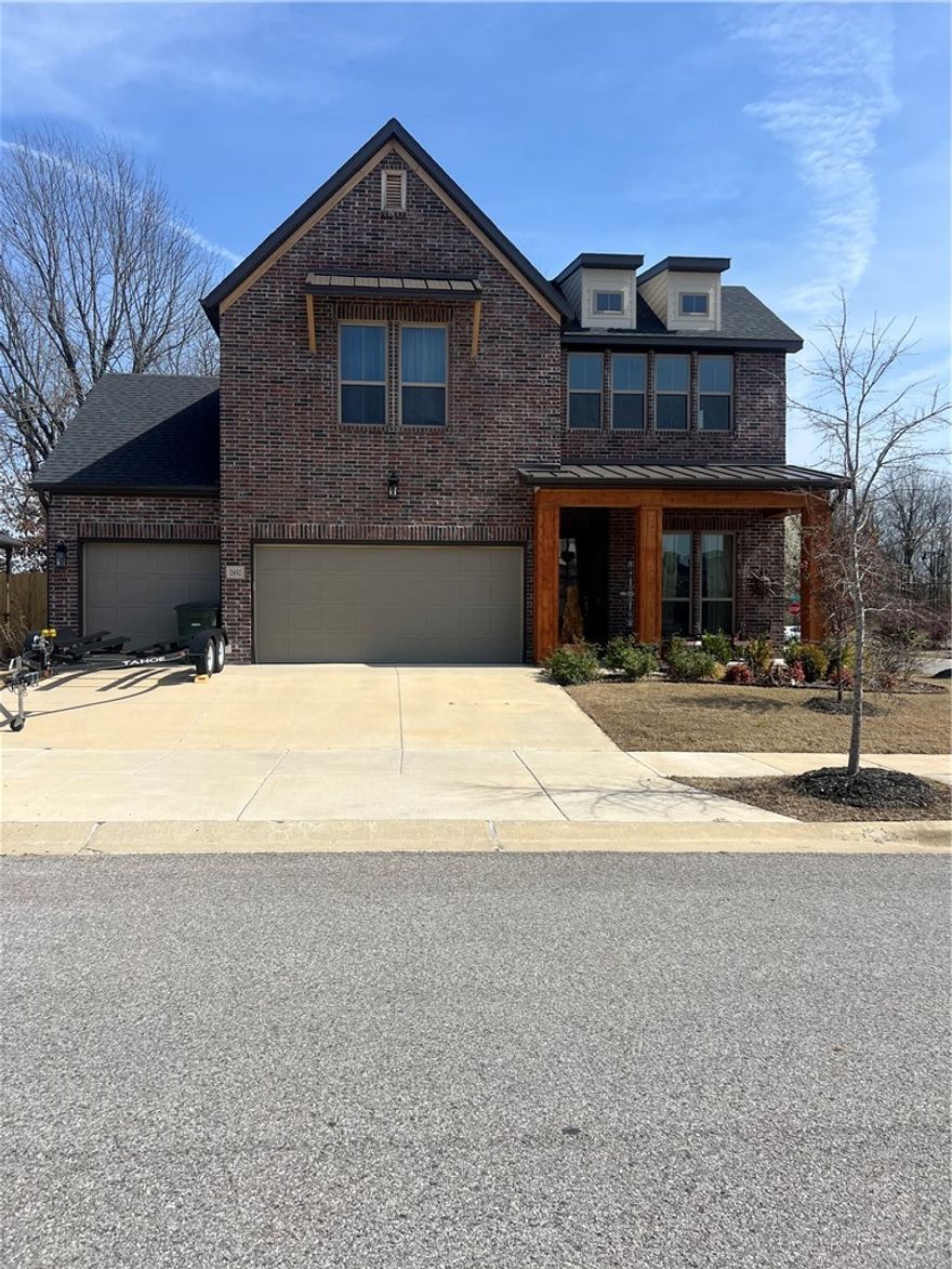 Stunning one owner home with great curb appeal on a corner lot in sought after Magnolia Park.  Step into this high-end home with tons of upgrades, where style meets convenience! The heart of the home features an open kitchen, dining, & living and is filled with natural light.  The kitchen boasts a large island, apron sink, sleek quartz countertops, gas cooktop, & stainless steel oven, dishwasher, refrigerator, & microwave. An additional bedroom/office is also in the downstairs area along with a powder room.  Upstairs has an additional living area/playroom, two bedrooms & a full bathroom with double sinks. The oversized covered back porch with additional wood/gas fireplace looks over a large fenced yard & serves as a bonus retreat area, providing plenty of seating for family & friends to enjoy.  There is also a 3 car garage (with EV charger) for all your bikes, tools & mower!  The home is perfectly situated near schools, parks, & trails with easy access to I-49.